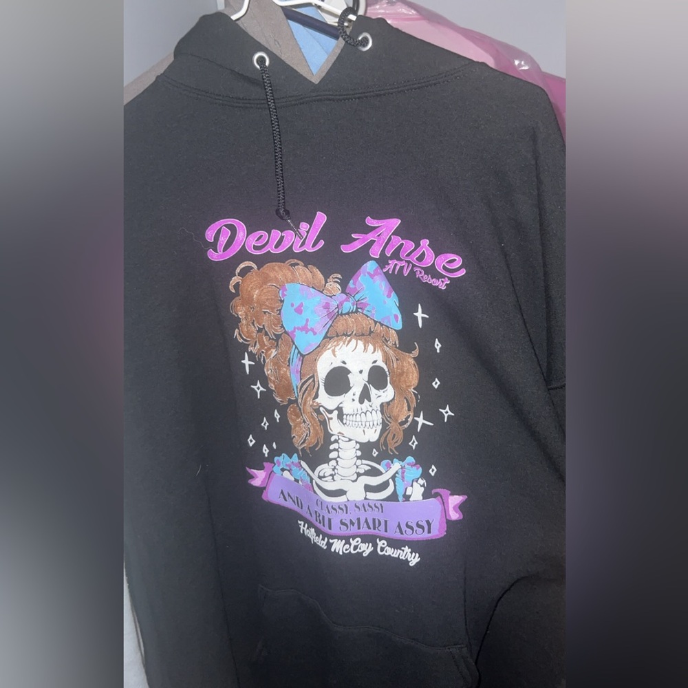 Black Hoodie with Skull and Bow Graphic